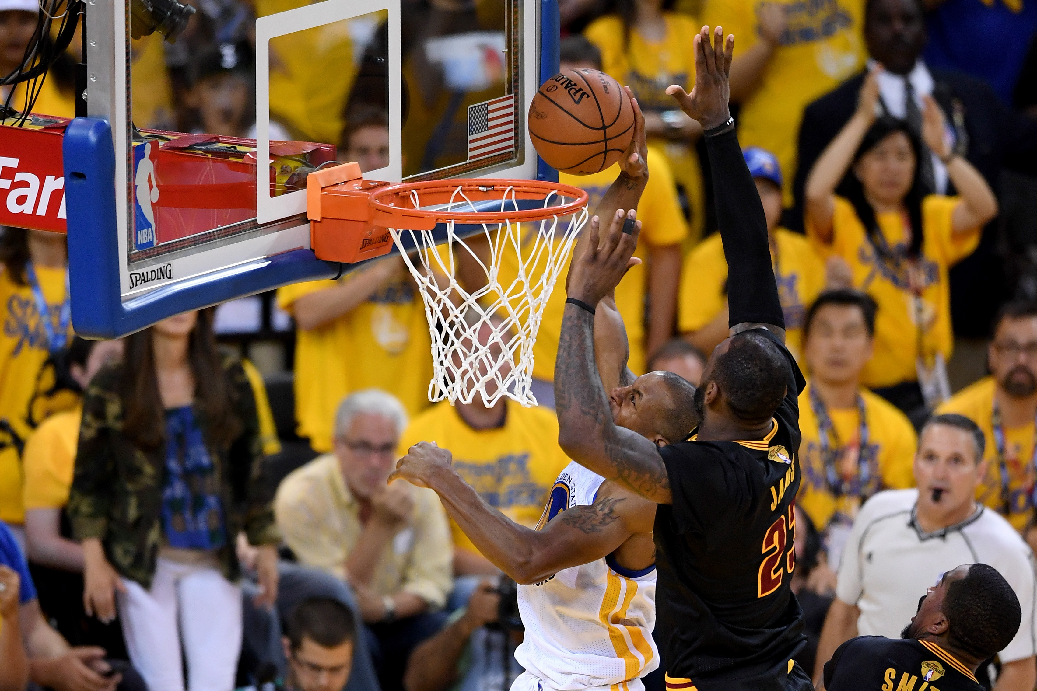 OAKLAND, CA - JUNE 19: LeBron James #23 of the Cleveland Cavaliers blocks a shot by Andre Iguodala #9 of the Golden State Warriors in Game 7 of the 2016 NBA Finals at ORACLE Arena on June 19, 2016 in Oakland, California. NOTE TO USER: User expressly acknowledges and agrees that, by downloading and or using this photograph, User is consenting to the terms and conditions of the Getty Images License Agreement. (Photo by Thearon W. Henderson/Getty Images)