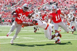 COLUMBUS, OH - SEPTEMBER 3: Demario McCall #30 of the Ohio State Buckeyes stiff arms Cameron Jefferies #18 of the Bowling Green Falcons while carrying the ball during the fourth quarter on September 3, 2016 at Ohio Stadium in Columbus, Ohio. Ohio State defeated Bowling Green 77-10. (Photo by Kirk Irwin/Getty Images)