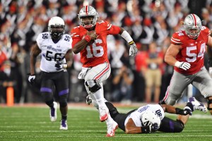 COLUMBUS, OH - OCTOBER 29: Quarterback J.T. Barrett #16 of the Ohio State Buckeyes breaks free for a 35-yard run in the fourth quarter against the Northwestern Wildcats at Ohio Stadium on October 29, 2016 in Columbus, Ohio. Ohio State defeated Northwestern 24-20. (Photo by Jamie Sabau/Getty Images)