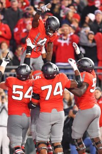 COLUMBUS, OH - NOVEMBER 5: Curtis Samuel #4 of the Ohio State Buckeyes celebrates in the end zone with Billy Price #54, Jamarco Jones #74 and Isaiah Prince #59, all of the Ohio State Buckeyes, after scoring on a one-yard touchdown reception at the end of the second quarter against the Nebraska Cornhuskers at Ohio Stadium on November 5, 2016 in Columbus, Ohio. (Photo by Jamie Sabau/Getty Images)