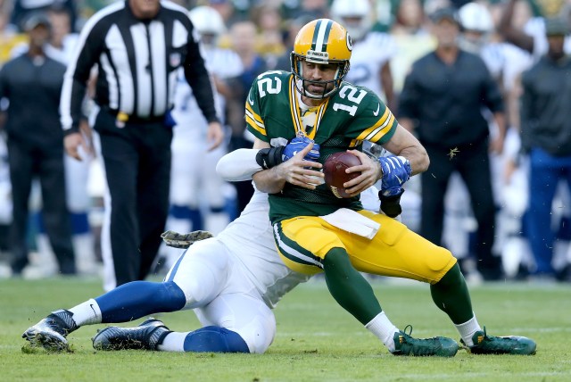 GREEN BAY, WI - NOVEMBER 06: Lavar Edwards #95 of the Indianapolis Colts sacks Aaron Rodgers #12 of the Green Bay Packers in the first quarter at Lambeau Field on November 6, 2016 in Green Bay, Wisconsin. (Photo by Dylan Buell/Getty Images)