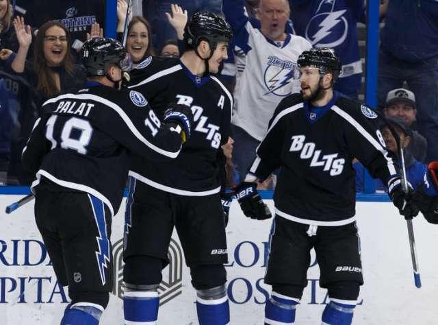 TAMPA, FL - DECEMBER 31: Brian Boyle #11 of the Tampa Bay Lightning celebrates his goal with teammates <a rel=