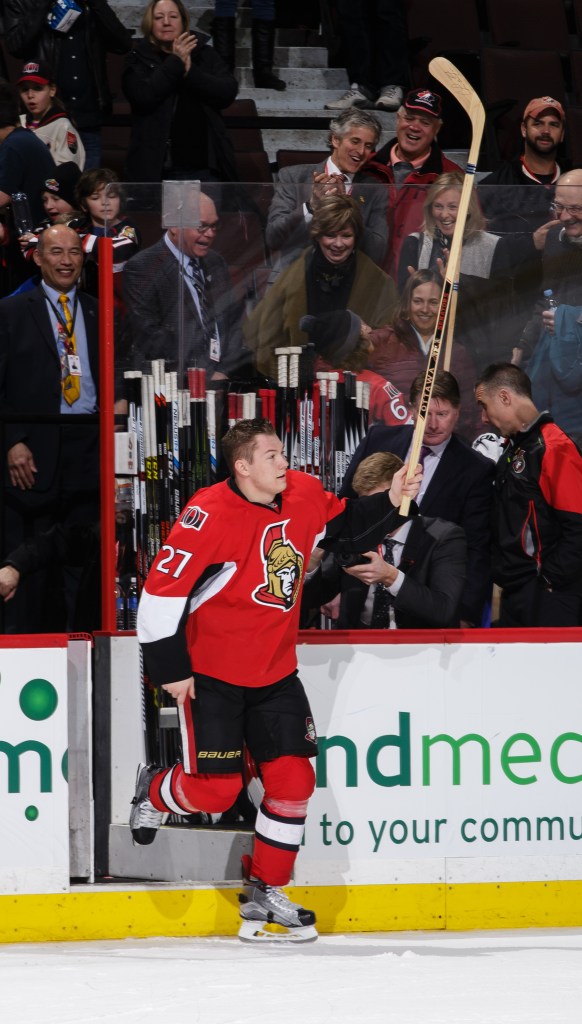 OTTAWA, ON - FEBRUARY 6: Curtis Lazar #27 of the Ottawa Senators acknowledges the fans as he steps on the ice after being named first star of the game following an NHL game against the Toronto Maple Leafs at Canadian Tire Centre on February 6, 2016 in Ottawa, Ontario, Canada. (Photo by Jana Chytilova/Freestyle Photography/Getty Images)