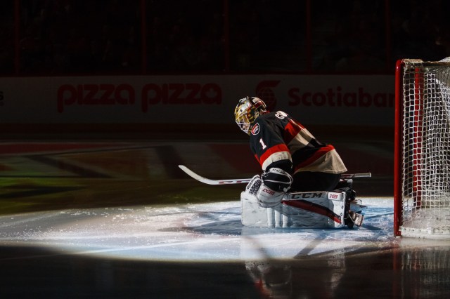 OTTAWA, CANADA - JANUARY 26: Mike Condon #1 of the Ottawa Senators stretches in front of his net prior to a game against the Calgary Flames at Canadian Tire Centre on January 26, 2017 in Ottawa, Ontario, Canada. (Photo by Francois Laplante/Freestyle Photography/Getty Images)