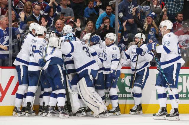 DENVER, CO - FEBRUARY 19: Members of the Tampa Bay Lightning celebrate an overtime goal against the Colorado Avalanche by Jonathan Drouin #27 at the Pepsi Center on February 19, 2017 in Denver, Colorado. The Lightning defeated the Avalanche 3-2 in overtime. (Photo by Michael Martin/NHLI via Getty Images)