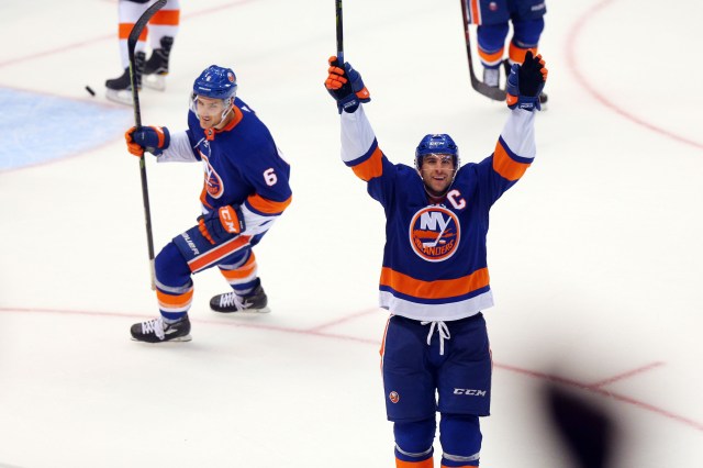 Sep 17, 2017; Uniondale, NY, USA; New York Islanders center John Tavares (91) celebrates his game winning goal against the Philadelphia Flyers during the overtime period of a preseason game at NYCB Live at the Nassau Veterans Memorial Coliseum. Mandatory Credit: Brad Penner-USA TODAY Sports