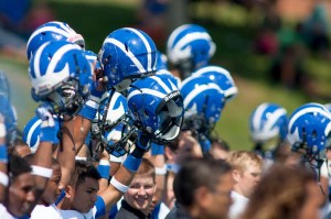 The Apopka Blue Darters hold up their helmets before kickoff against the Byrnes Rebels in one of the games from last season's High School Football Kickoff. Mandatory Credit: Photo: Jeremy Brevard, USA TODAY Sports 