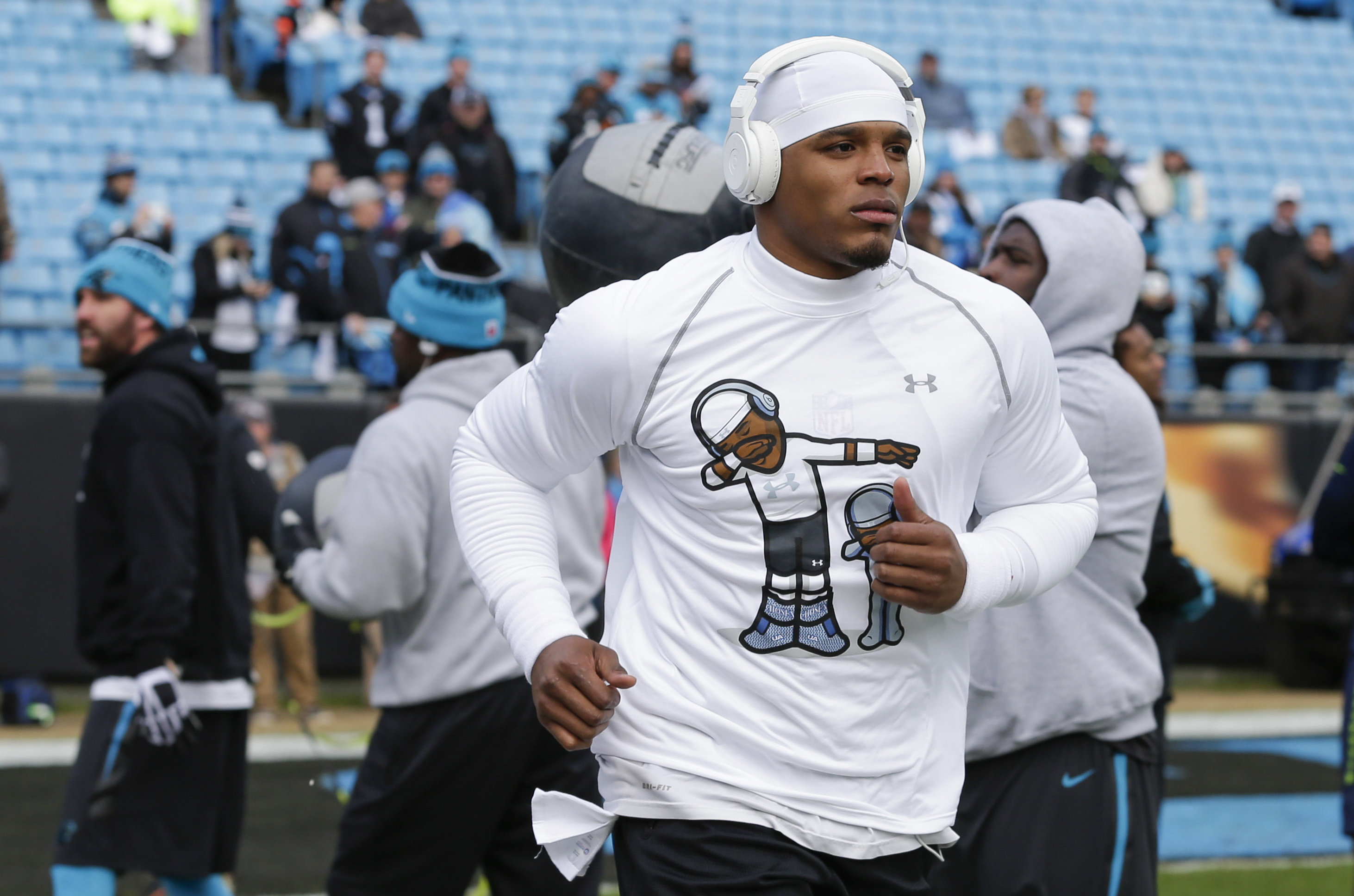 Jan 17, 2016; Charlotte, NC, USA; Carolina Panthers quarterback Cam Newton (1) runs onto the field prior to the game between the Seattle Seahawks and Carolina Panthers in a NFC Divisional round playoff game at Bank of America Stadium. Mandatory Credit: Jeremy Brevard-USA TODAY Sports ORG XMIT: USATSI-245816 ORIG FILE ID: 20160117_sal_bb4_012.JPG
