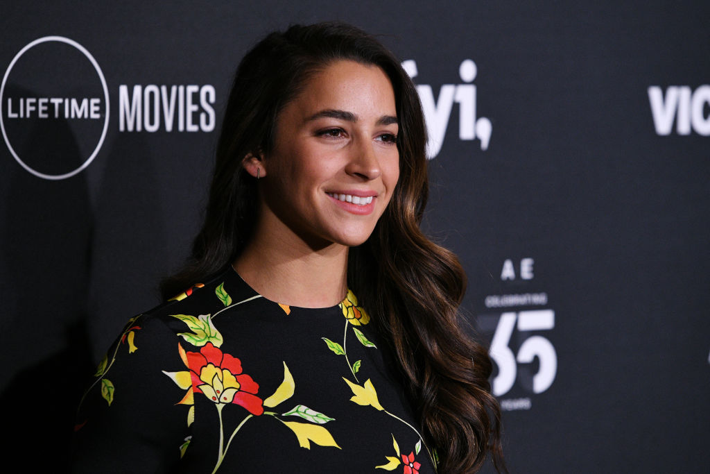 Aly Raisman poses nude, covered in messages of empowerment 