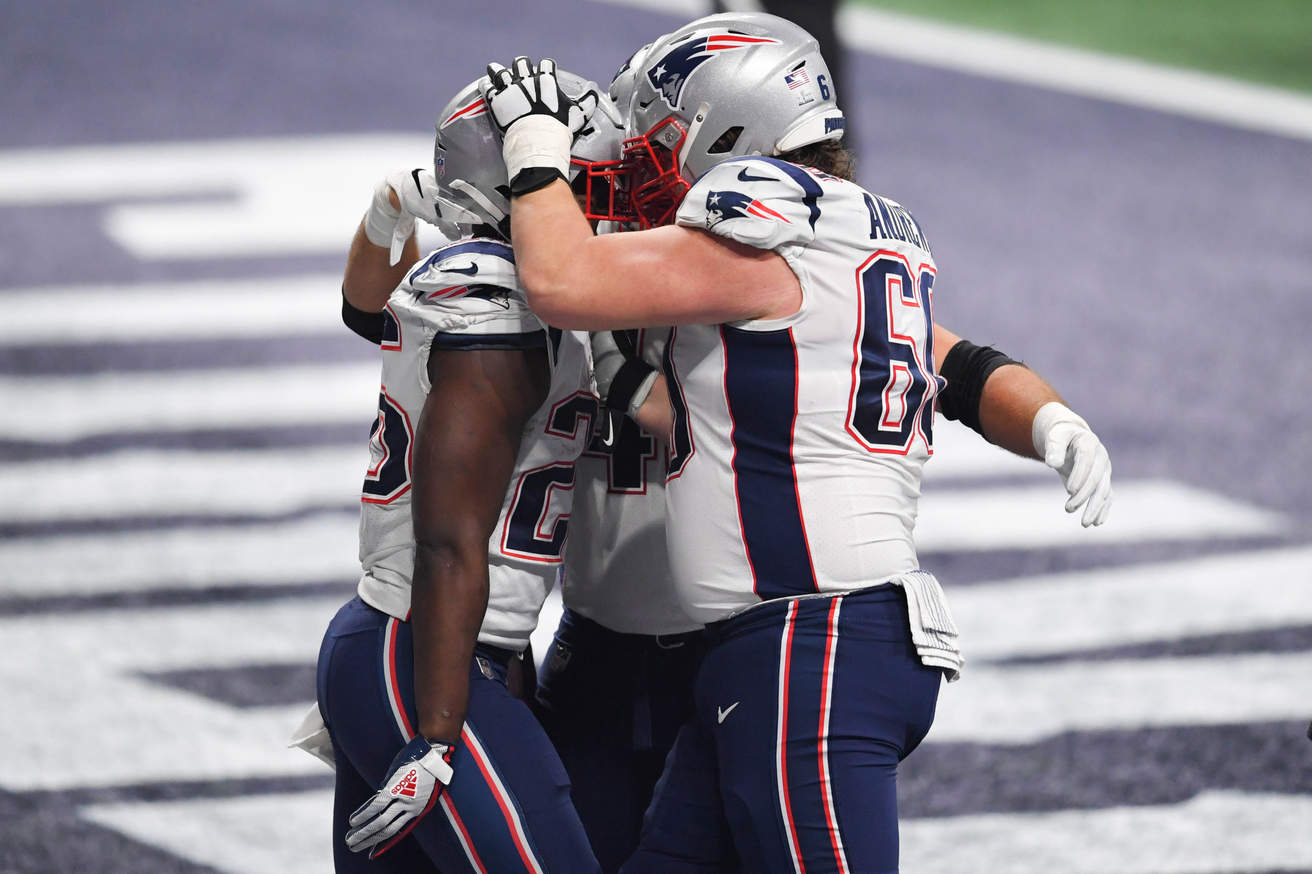 New England Patriots center David Andrews (60) congratulates