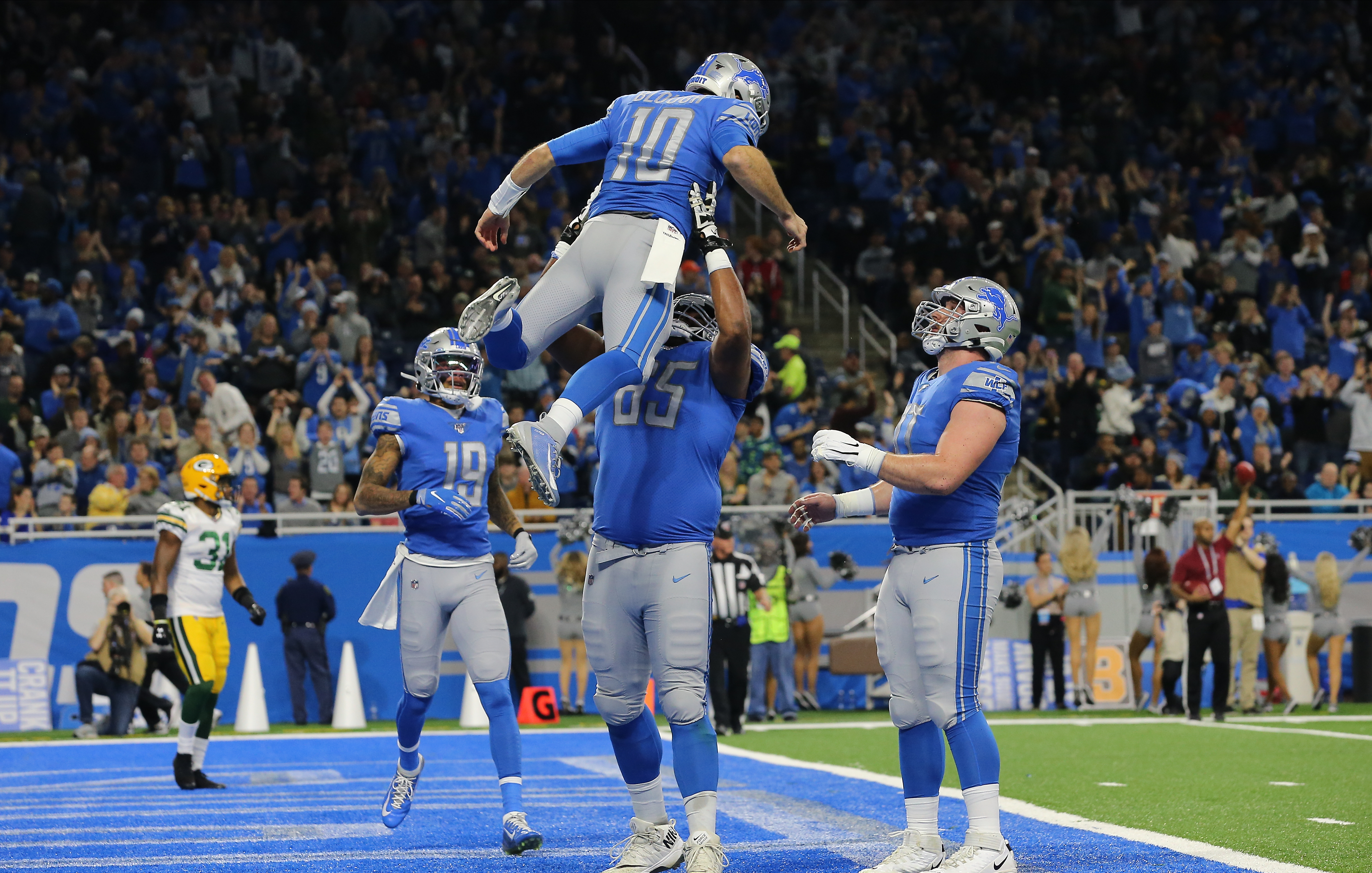 Trick plays, late touchdown drive help Detroit Lions end season with win  over Packers