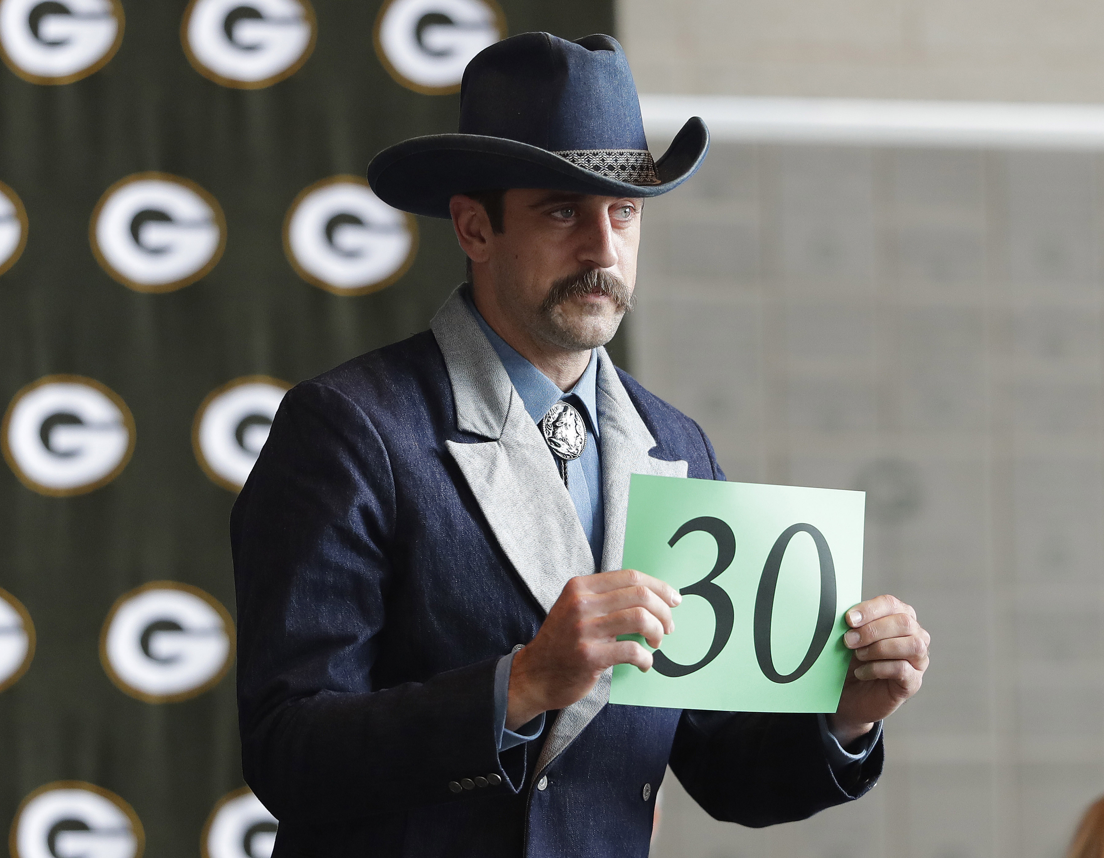 Aaron Rodgers sports Canadian tuxedo at Welcome Back Packers Luncheon