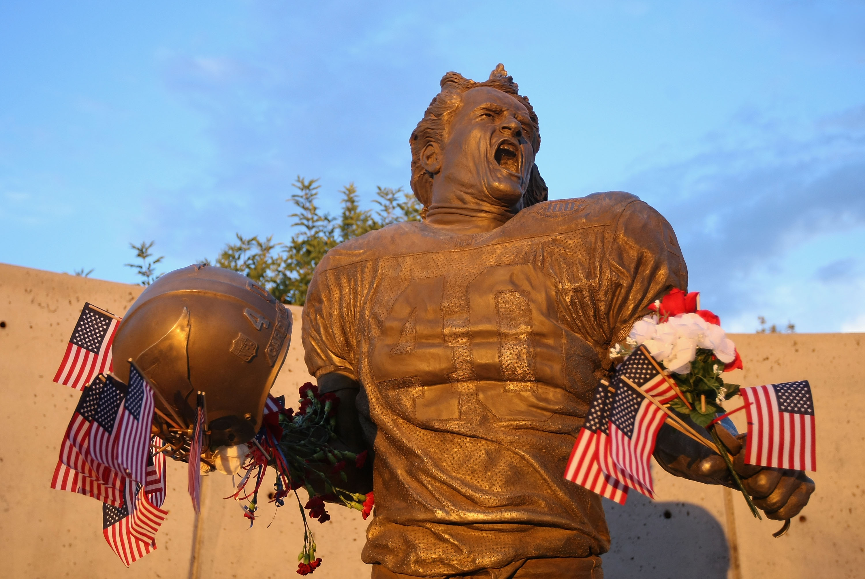 Getty Images - A fan wearing a Pat Tillman jersey sits