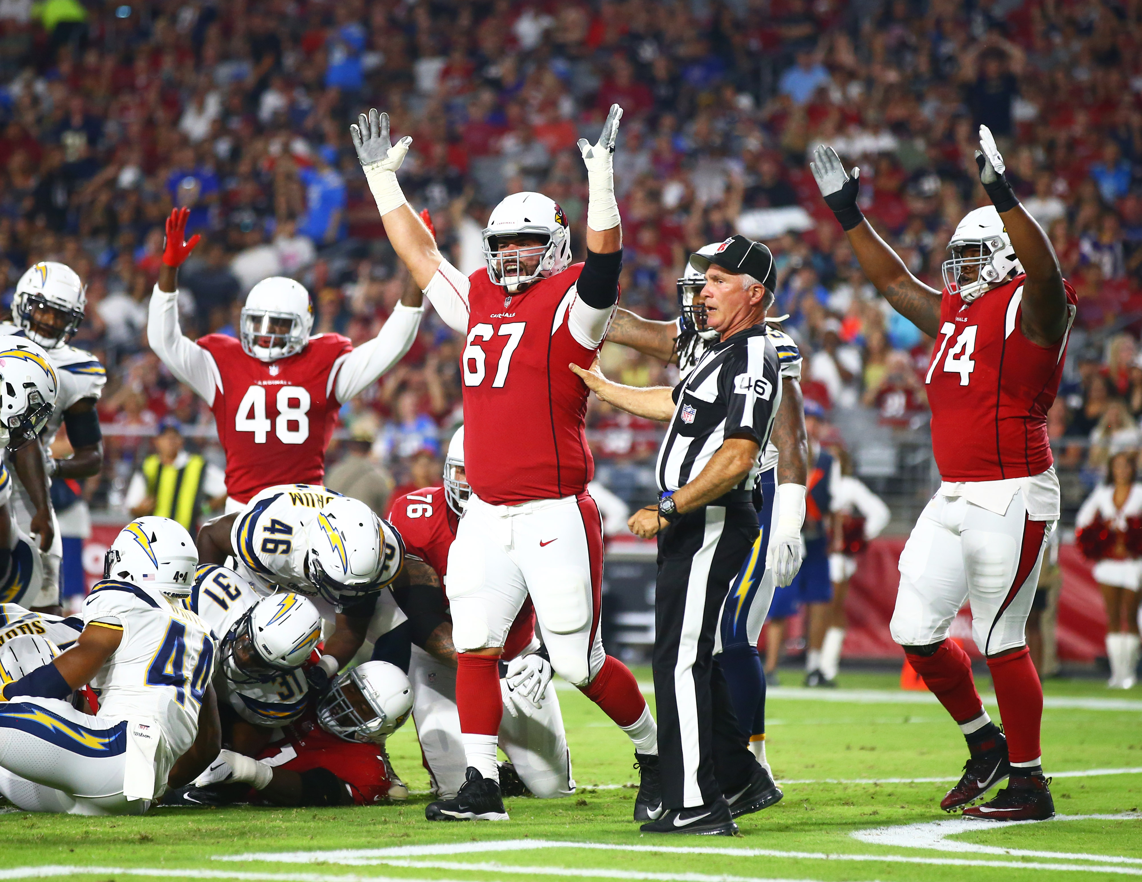 Arizona Cardinals' positional priorities begin at the line of