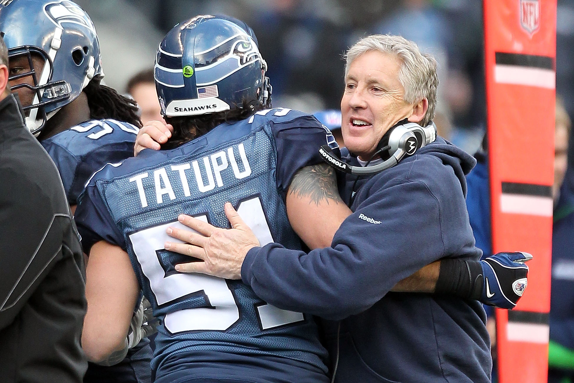 Seattle Seahawks' Lofa Tatupu smiles during NFL football practice Monday,  May 24, 2010, in Renton, Wash. (AP Photo/Elaine Thompson Stock Photo - Alamy