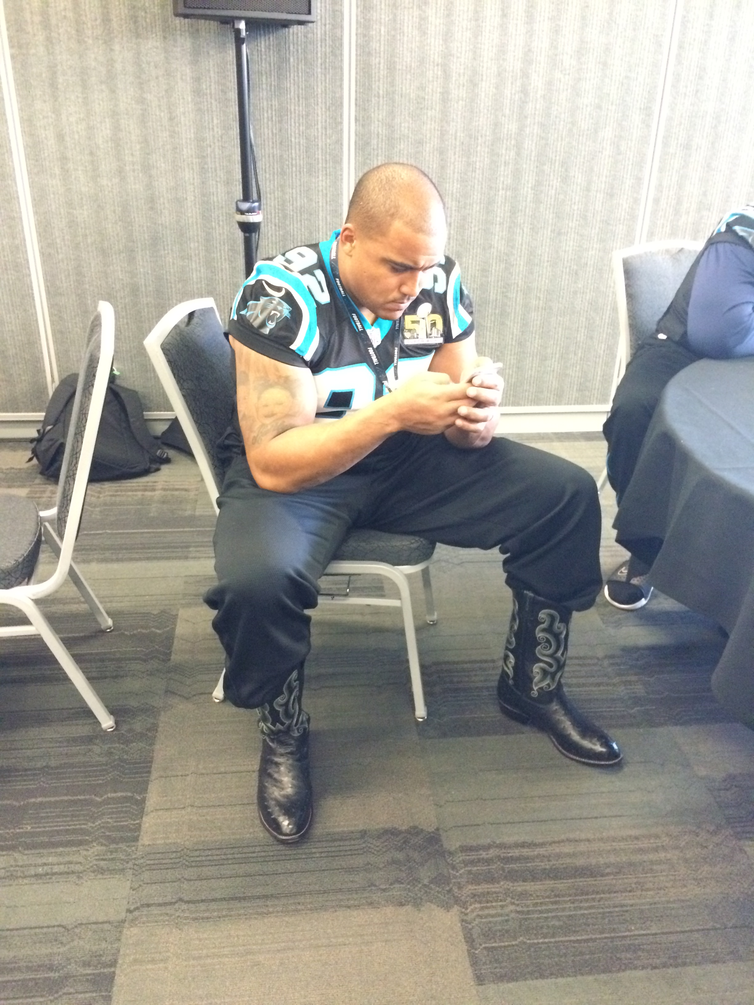 buys Panthers teammates cowboy boots