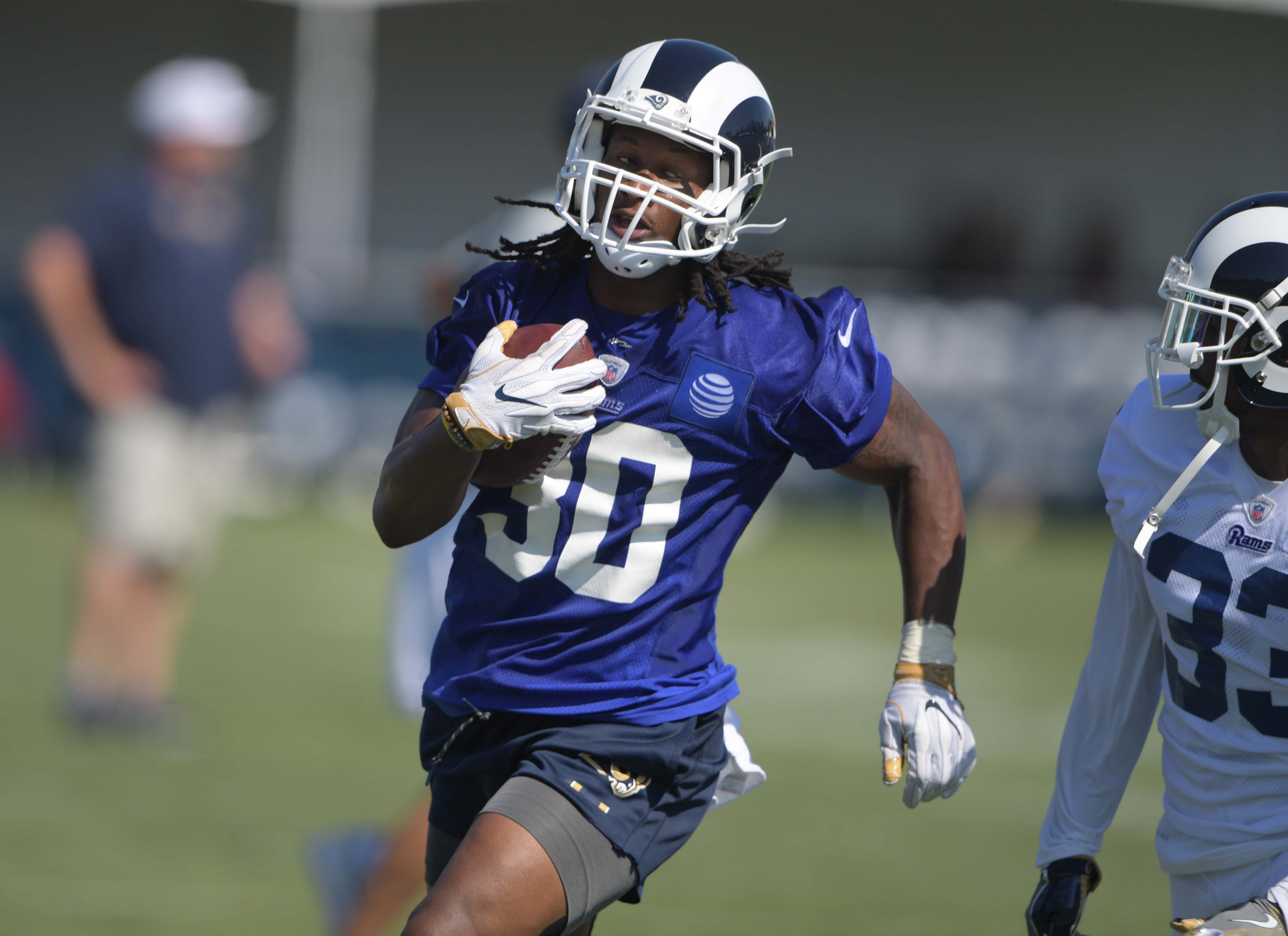 LA Rams Head Coach Sean McVay consults with Todd Gurley during the