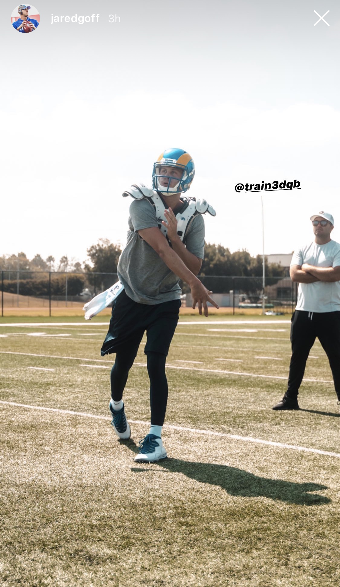 Los Angeles Rams quarterback Jared Goff wears an NFC Champions hat