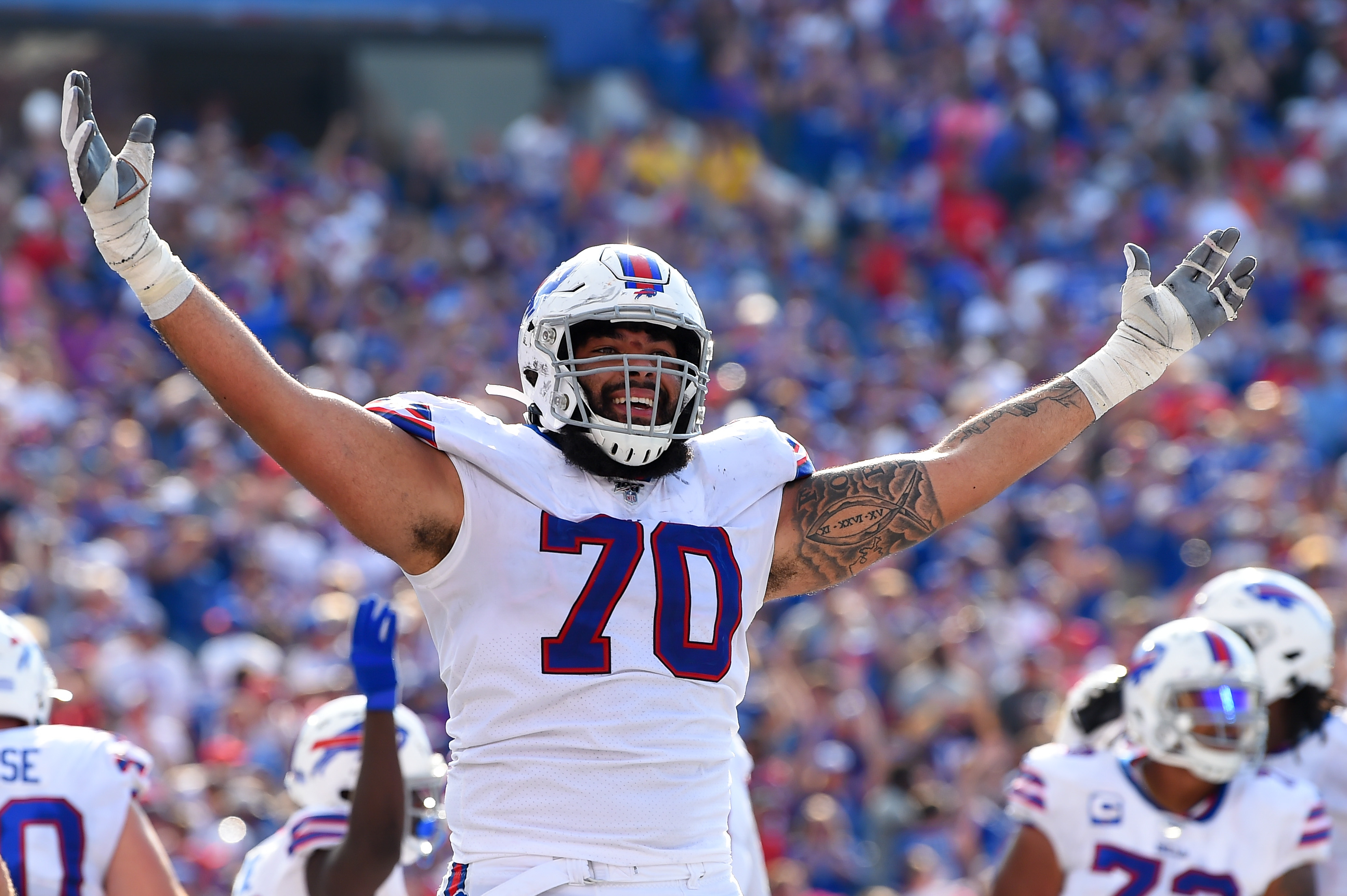 Quinton Spain to re-sign with Buffalo Bills 