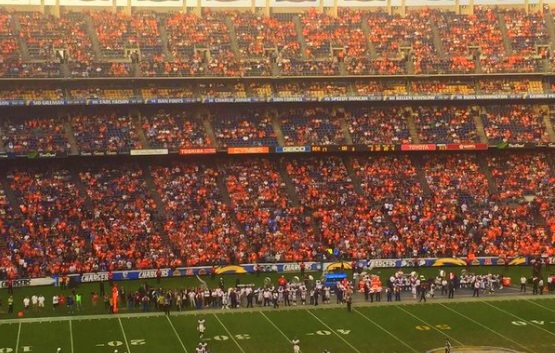 Denver Broncos vs. Los Angeles Chargers. Fans support on NFL Game.  Silhouette of supporters, big screen with two rivals in background Stock  Photo - Alamy