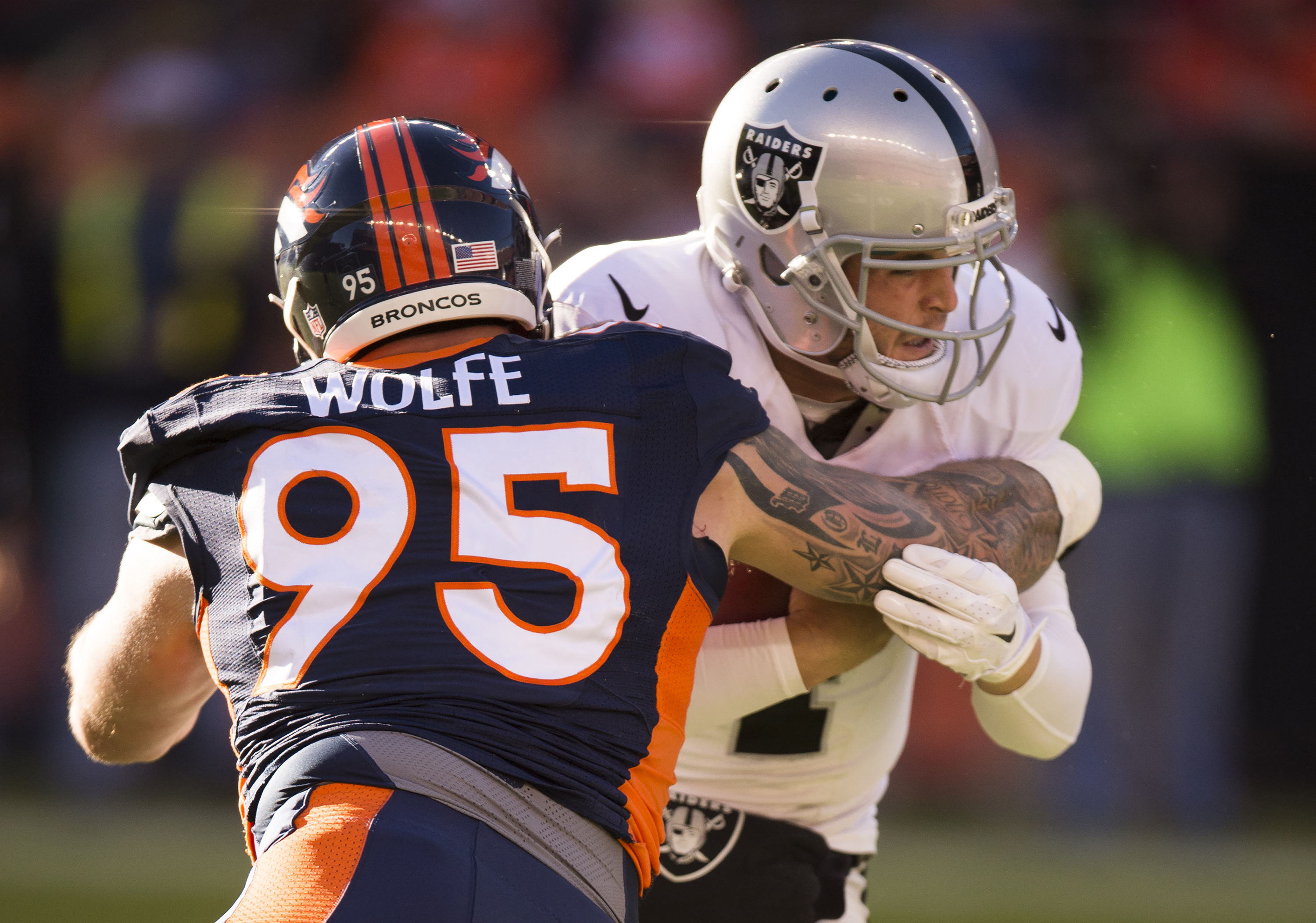 Broncos' Derek Wolfe sets career high for sacks, dislocates elbow