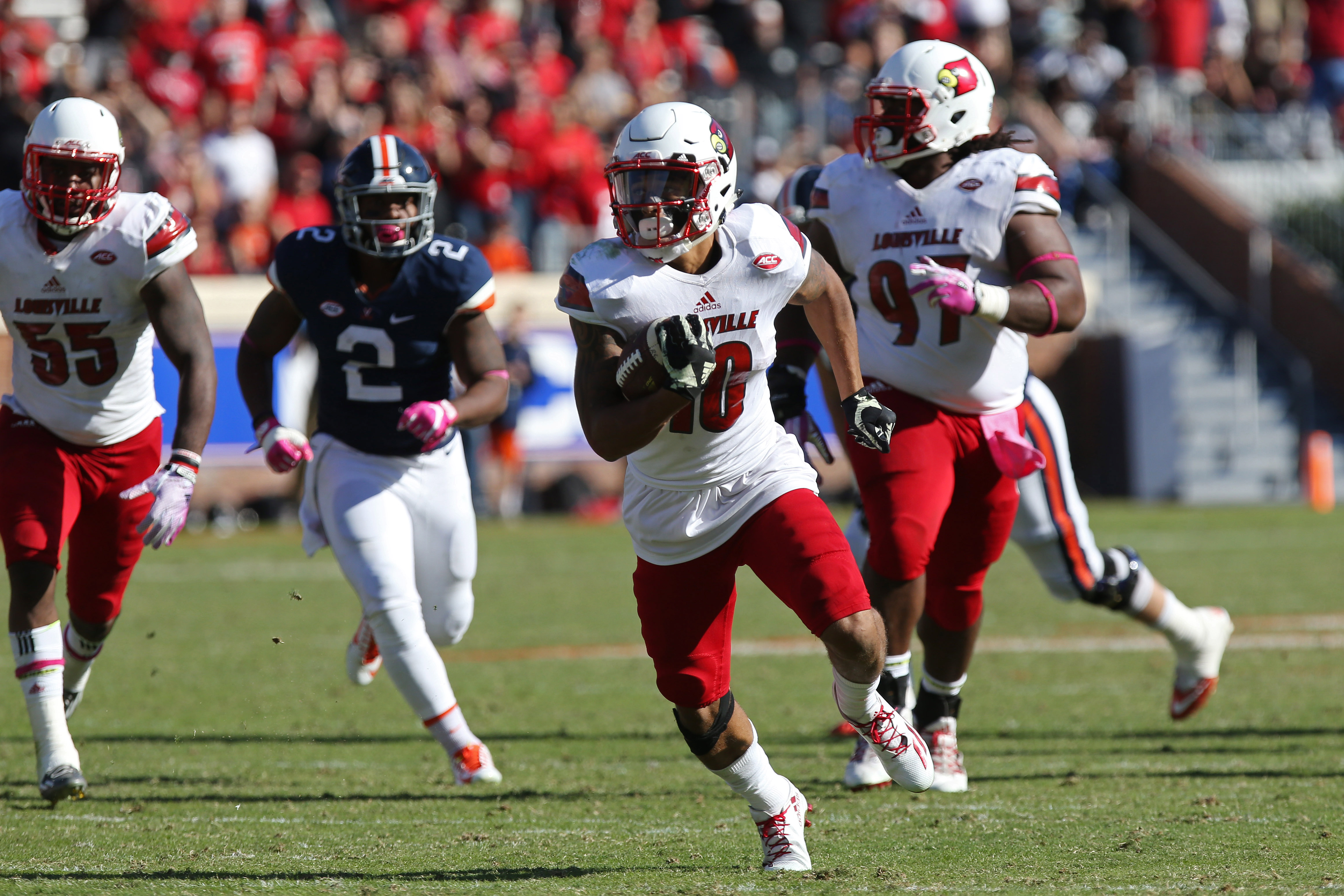 Louisville Football on X: Jaire Alexander and Lamar Jackson enjoy  Saturday's win with some youngsters from the Kids Cancer Alliance   / X