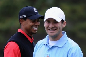 PEBBLE BEACH, CA - FEBRUARY 12: Tiger Woods (L) and Tony Romo (R), NFL football quarterback for the Dallas Cowboys, share a laugh on the fifth hole during the final round of the AT&T Pebble Beach National Pro-Am at Pebble Beach Golf Links on February 12, 2012 in Pebble Beach, California. (Photo by Harry How/Getty Images)