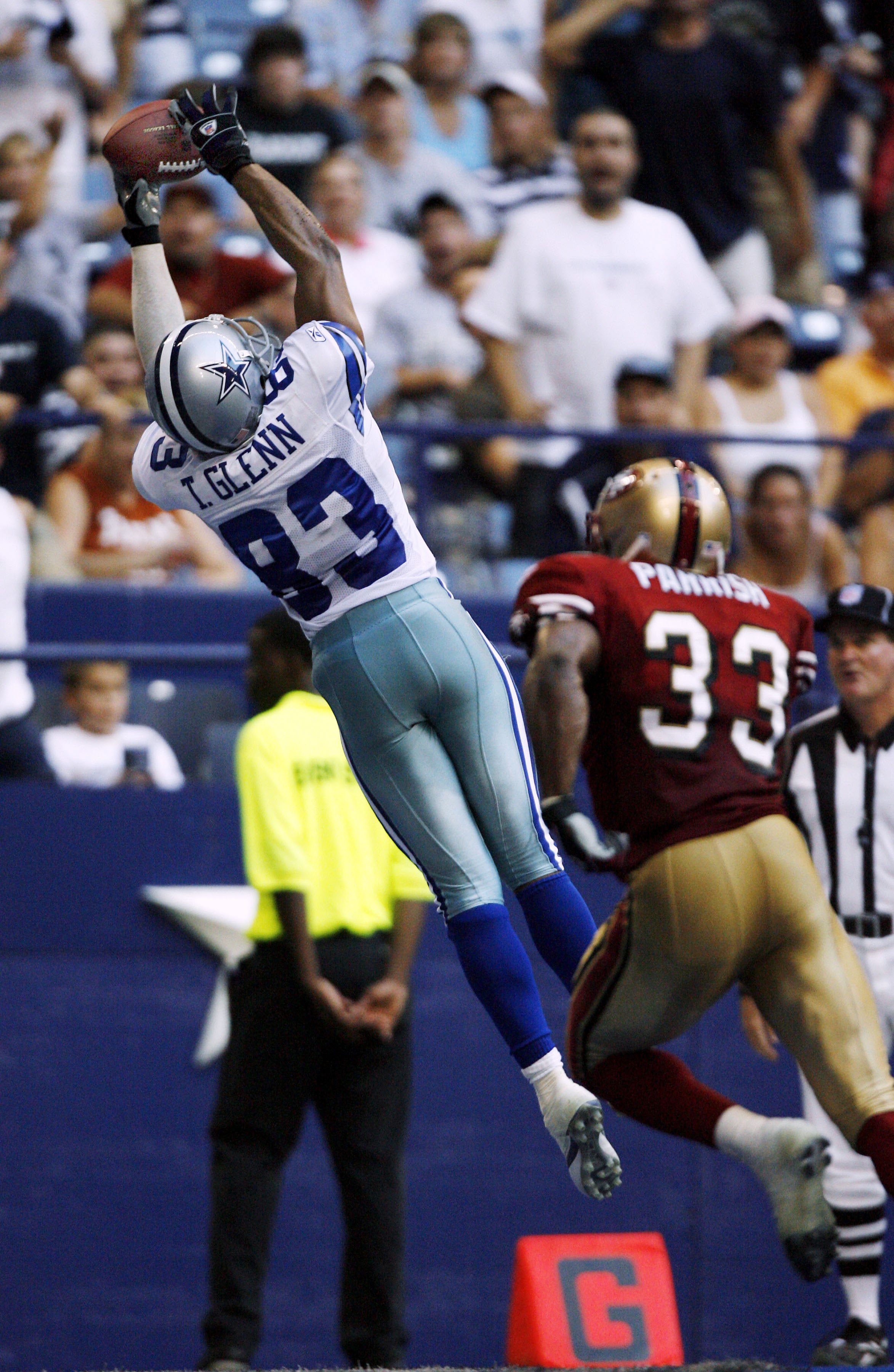 Wide receiver Terry Glenn, of the Dallas Cowboys, returns a pass down  field, in the 3rd quarter, as the Dallas Cowboys face the New England  Patriots, at Gillette Stadium, in Foxboro, Mass