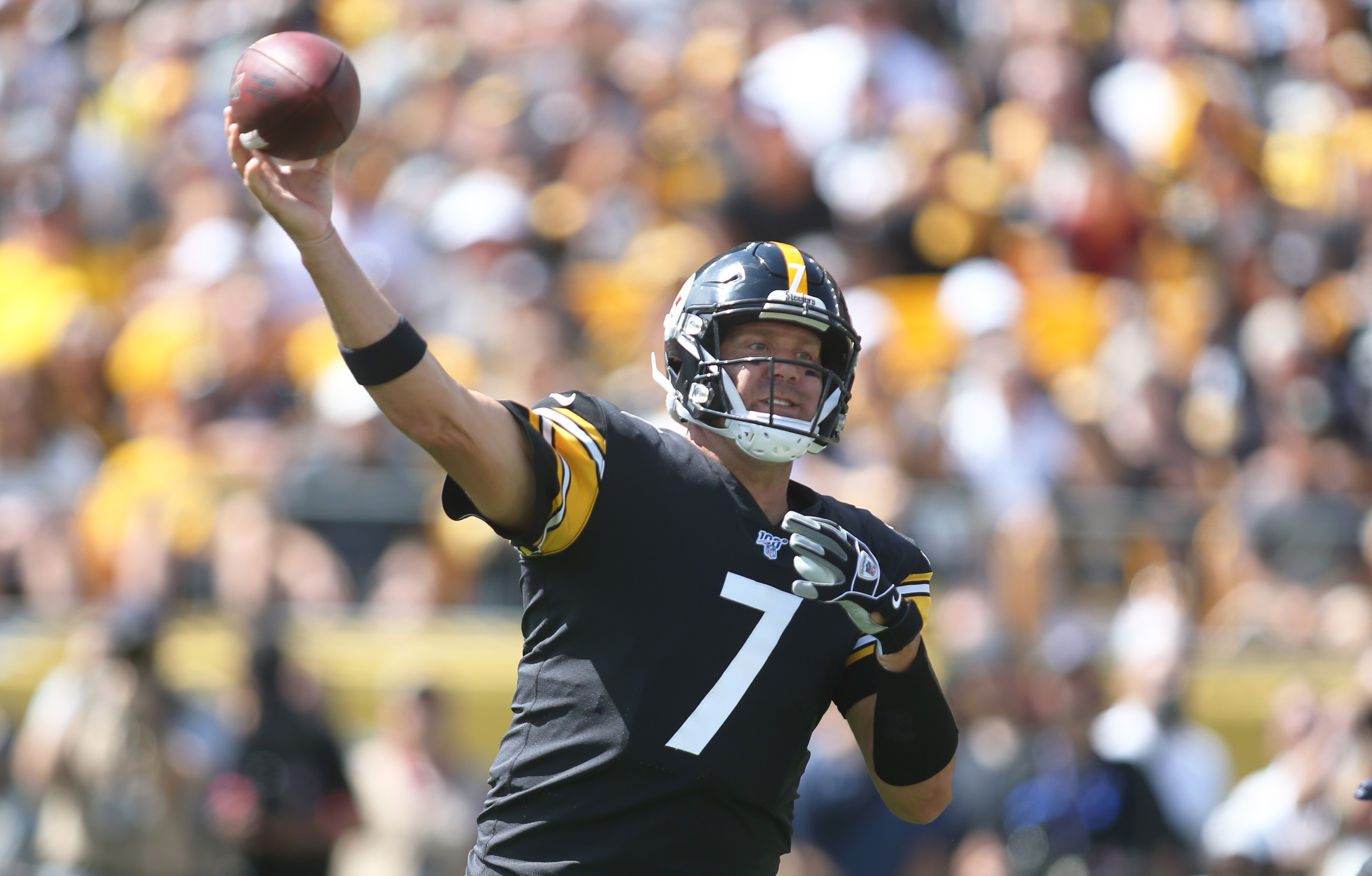 Quarterback Bubby Brister of the Pittsburgh Steelers warms up on