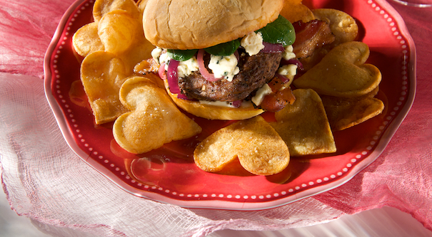These impressive half-pound steak burgers are loaded with crisp peppered bacon, melting bleu cheese and golden carmelized onions.