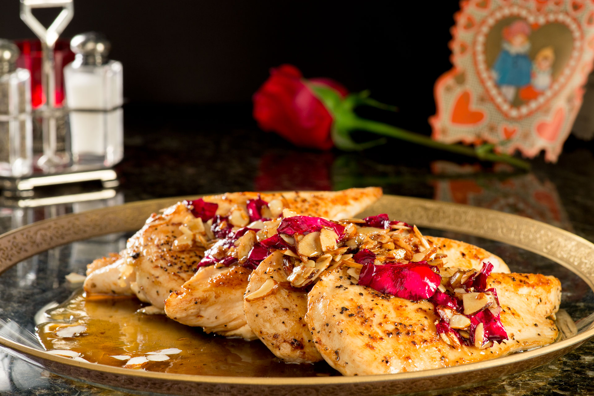 This floral-inspired sauteed chicken is made with garlic, almonds, honey and real crushed rose petals which release an aroma and natural oils to create a beautiful and deliciously unique dish.