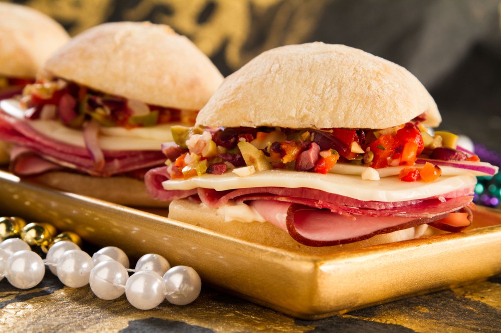Try this bayou classic out at Mardi Gras or turn your dinner into an authentic Louisiana experience by serving this muffuletta that is stuffed with cheese, three kinds of meats, and a unique creole relish.
