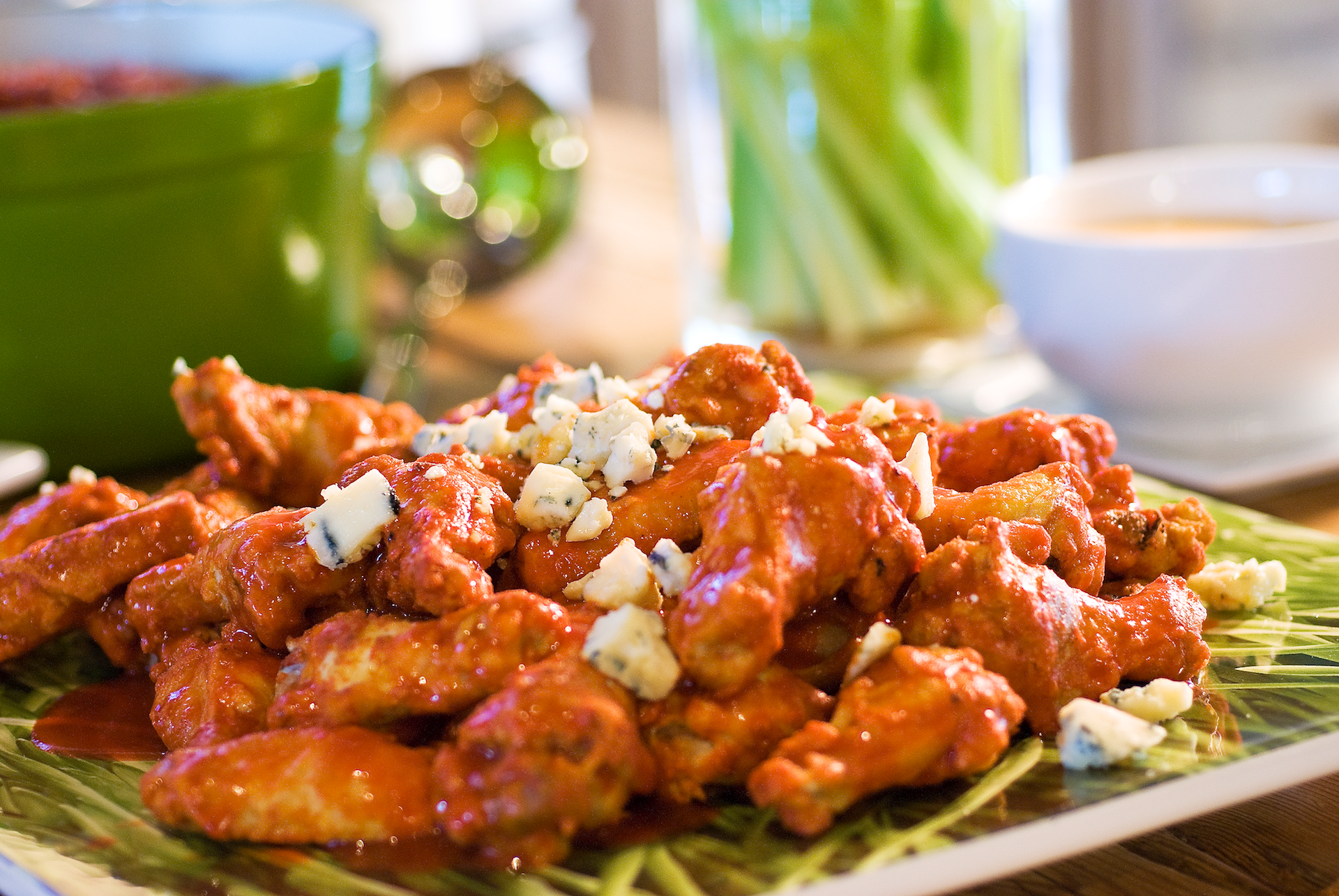 Golden-crispy hot wings smothered in a buttery, hot-and-spicy Buffalo wing sauce and crumbled blue cheese.