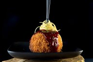This softball-size meatball, made to resemble an Italian meatball impaled with a forkful of pasta, holds a secret filling. The Big One is actually a deep-fried meatball filled with a molten center of smoky pulled pork, two kinds of cheese and BBQ sauce!