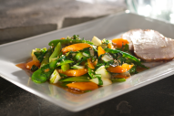This fresh, colorful Asian vegetable stir-fry features crisp bok choy, snow peas, orange bell pepper and scallions tossed in an aromatic chili orange glaze with ginger and toasted sesame oil.