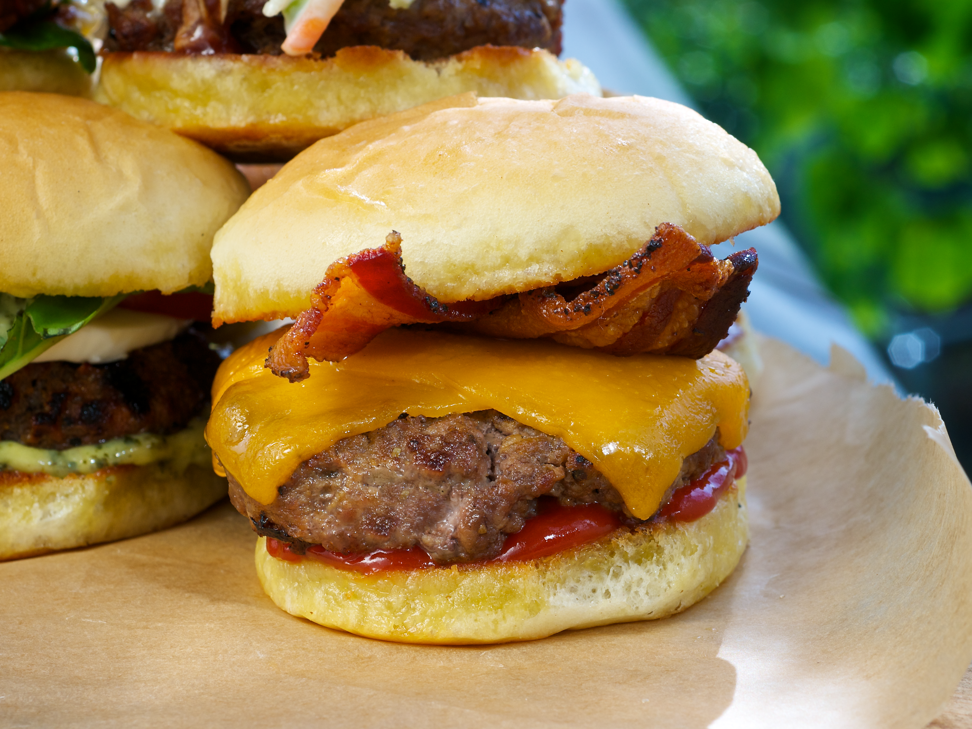 The traditional, indulgent, American cheeseburger slider, topped with smoky bacon!