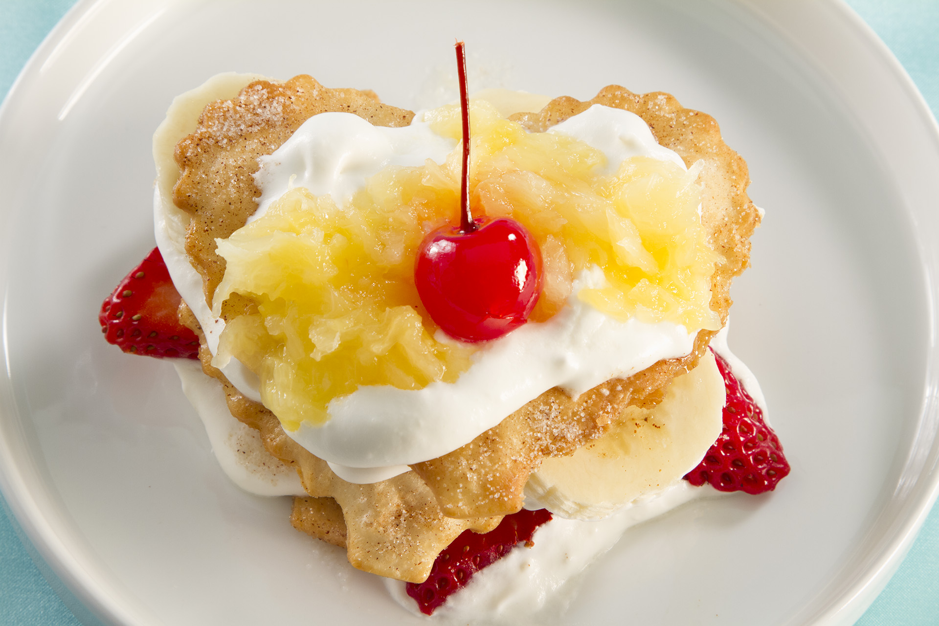 This is a great way to dress up a simple banana split and make it fit for a Dutchess!