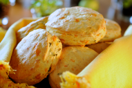 These warm and cheesy scones make an unexpected and welcome addition to any meal. These scones are full of flavor. Try them with dinner and maybe even breakfast. 