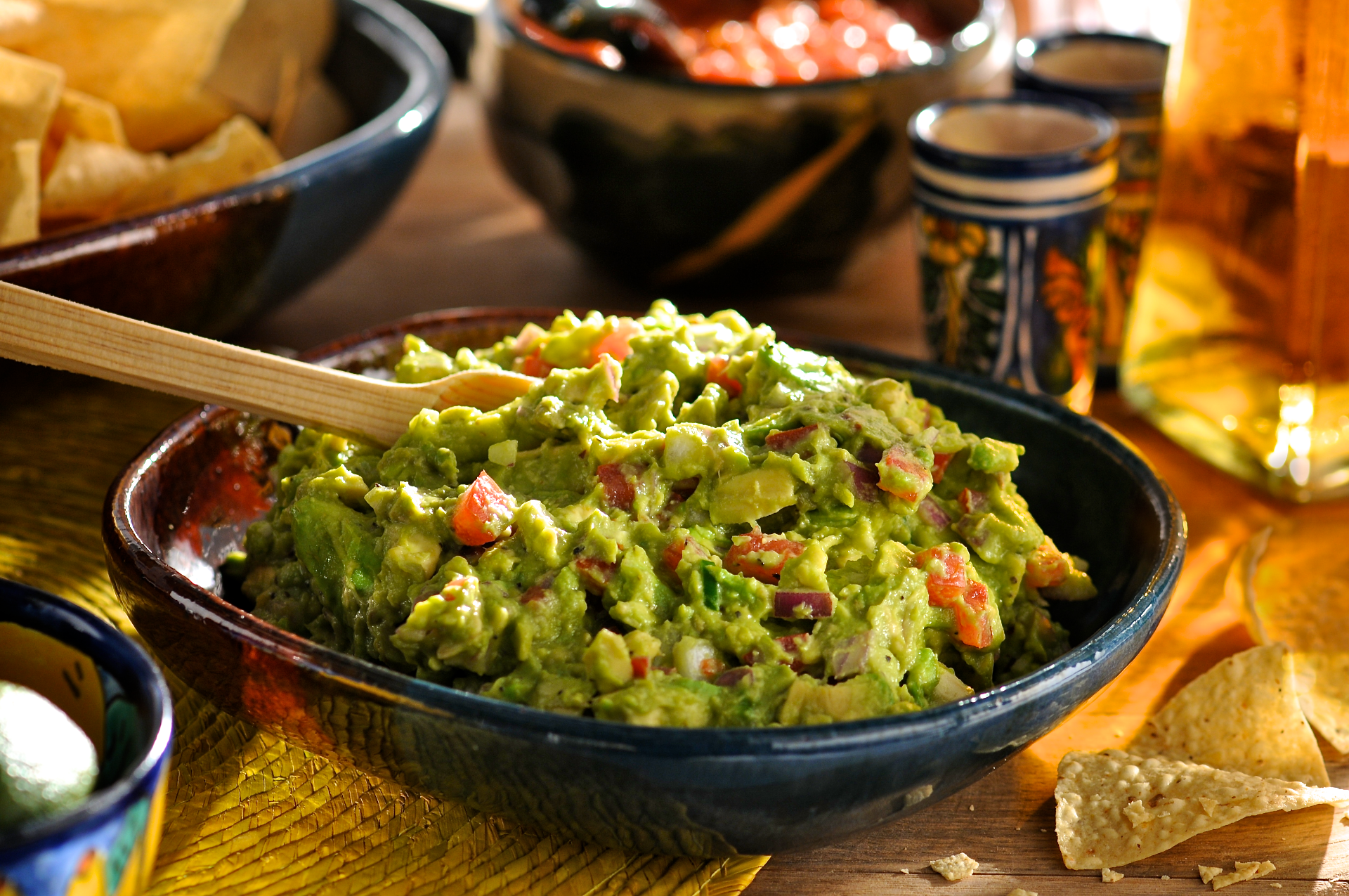 Freshly chopped avocado and diced ripe tomatoes make for an incredibly delicious and gorgeously green guacamole. Warm up some tortilla chips and dig in! Freshly-made guacamole really hits the spot, served with crisp chips and an ice-cold Margarita.