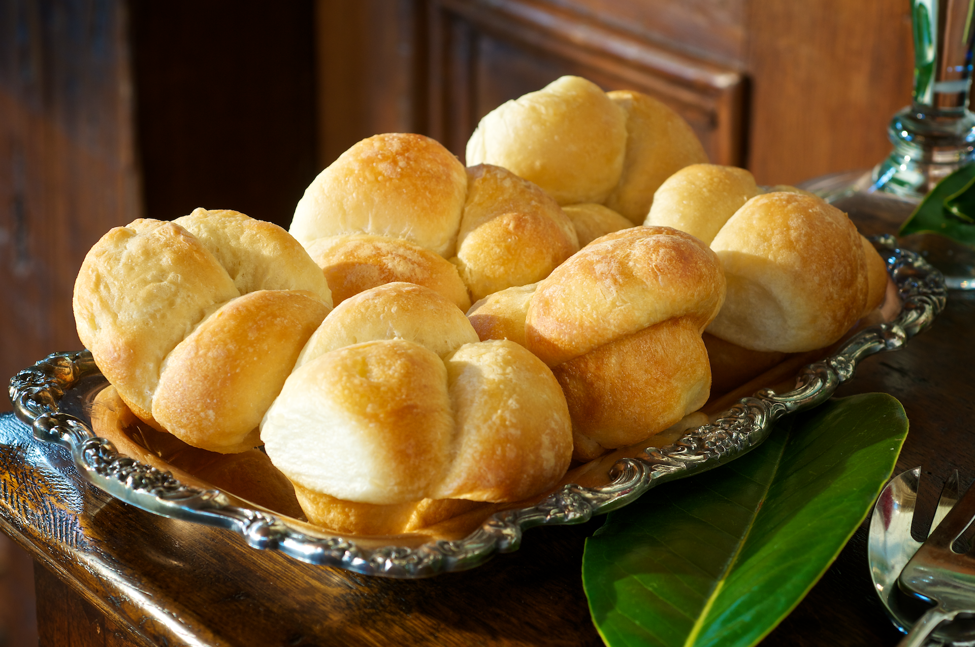 Buttery pull-apart rolls served fresh-baked hot from the oven! Pair these with the honey butter recipe below and you've got a beautiful presentation of dinner rolls.
