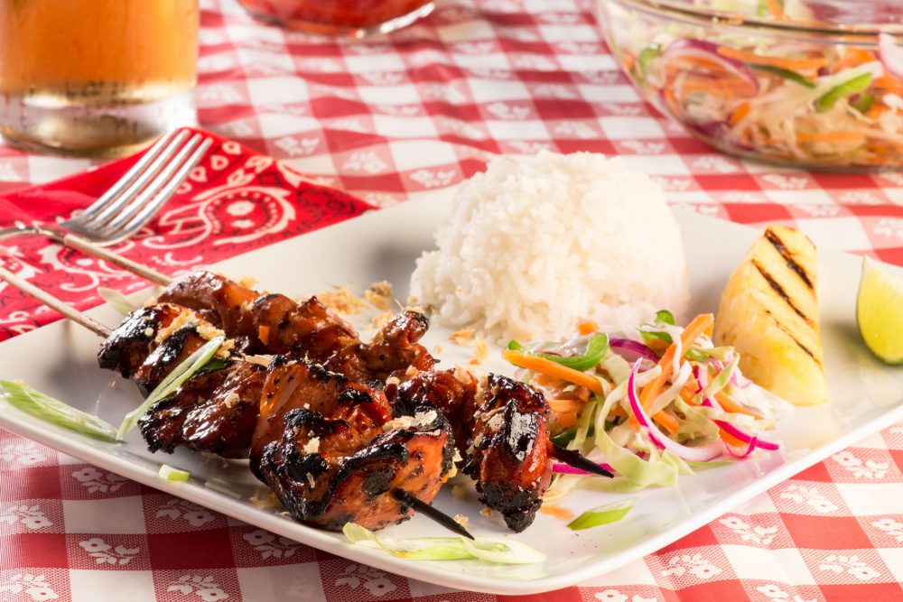 Spice up your barbecue by trying some new flavors. Filipino Barbecue Chicken Skewers are marinated overnight in a Banana Ketchup Barbecue sauce and then grilled and re-slathered in the delicious sauce, paired with fresh relish slaw.