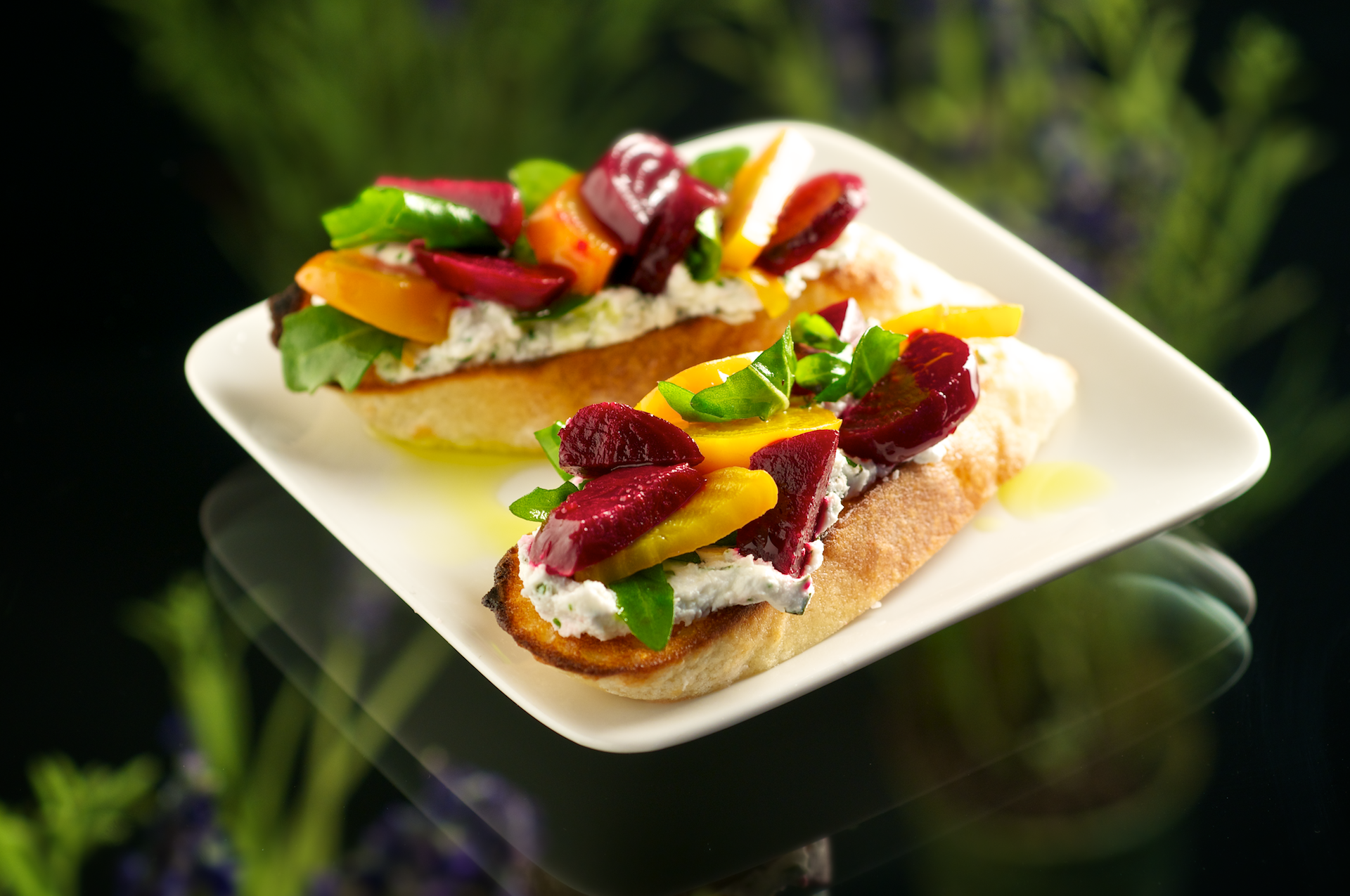 This hand-held appetizer combines beet arugula salad with goat cheese for an unexpected and delightful taste experience. These would make great canapes at a cocktail party. 