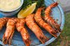 This recipe makes it easy to cook perfectly grilled prawns over an outdoor barbecue for maximum flavor! The prawns take very little time, just enough to turn the flesh opaque, and you have delicious grilled seafood.