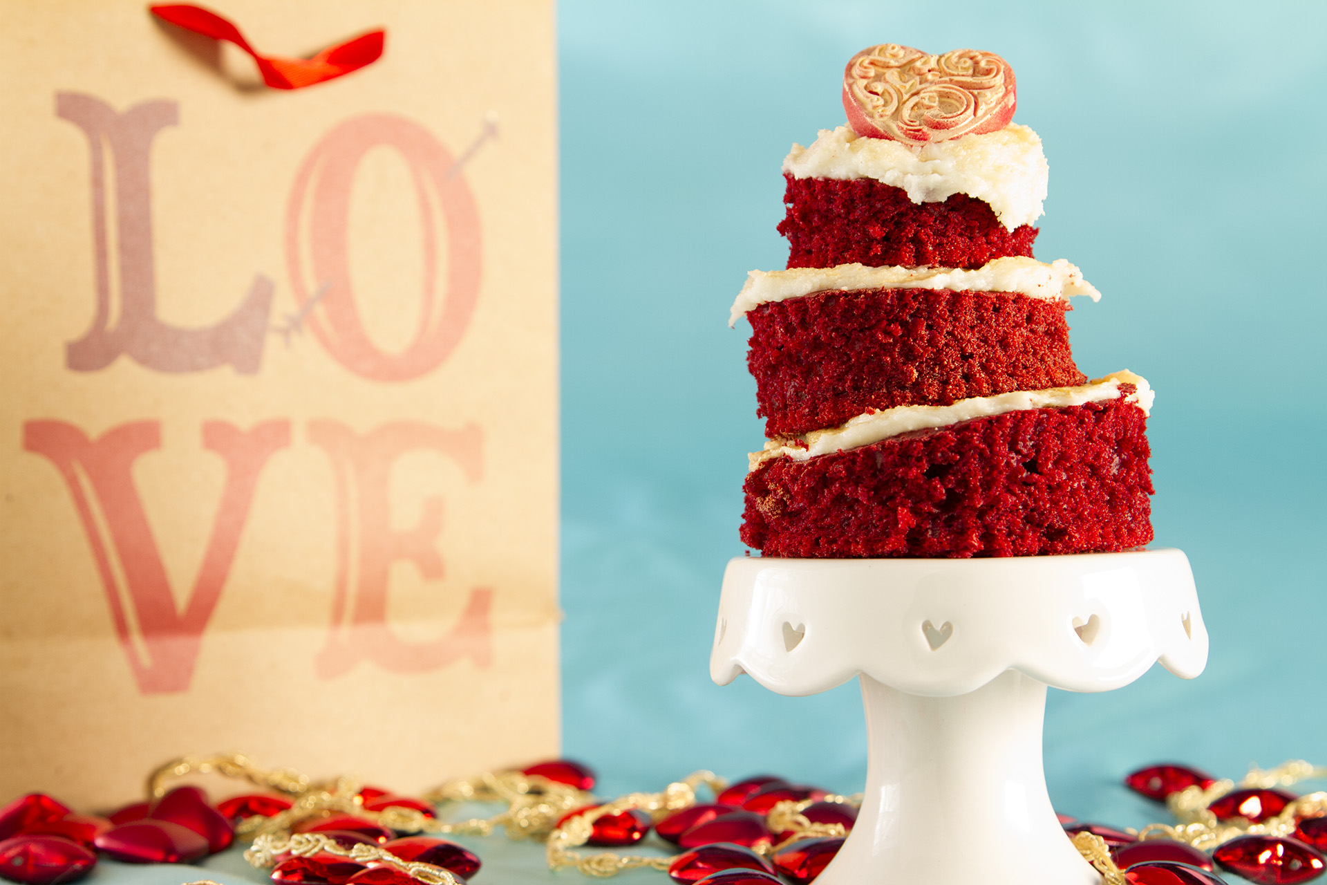 Shake up your average red velvet cake by making it into a fun Valentine's Day treat, its totally easy and the assembly is fun.