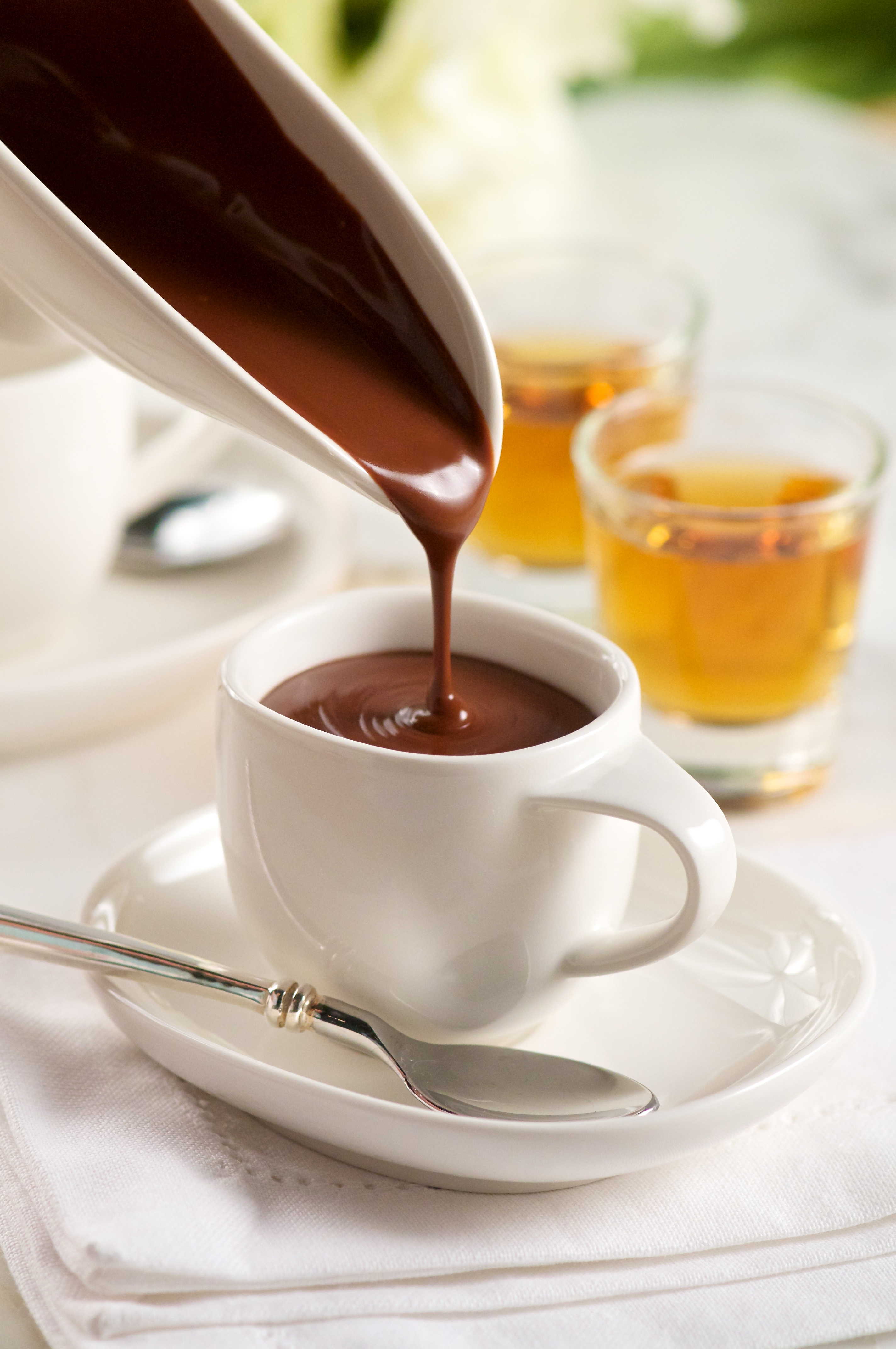 This simple recipe for two is similar in its richness to a great espresso drink. It’s a dark and decadent sipping chocolate served hot, and a little goes a long way toward creating a perfect romantic moment.
