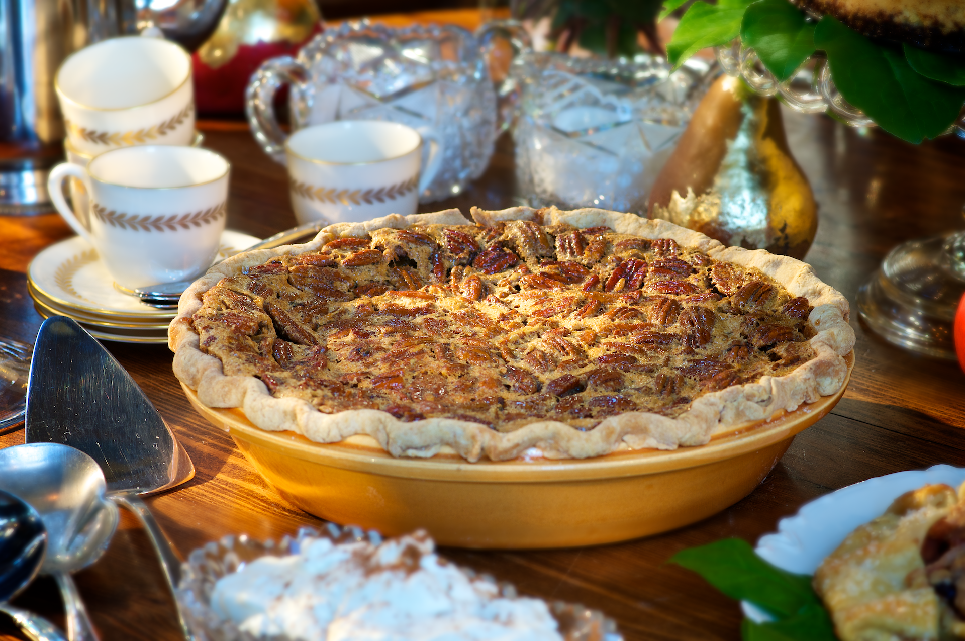Silky-rich sweet potato pie topped with a layer of golden caramelized pecan pie, this authentic Southern pie offers a standout dessert for the holiday. Wonderful topped with a scoop of cinnamon ice cream or a dollop of whipped cream