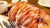 A pit ham has been internally trimmed to remove the bone and much of the fat, while leaving the marbling for flavor.
