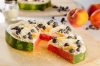 Yep, we made a watermelon pizza topped with peach cream cheese spread, mixed with a little whipped topping and powdered sugar, then layered that with peaches and blueberries and topped it with some shaved white chocolate. 