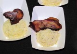 photo from the Baby Got Brunch event of jowl bacon with grits. 