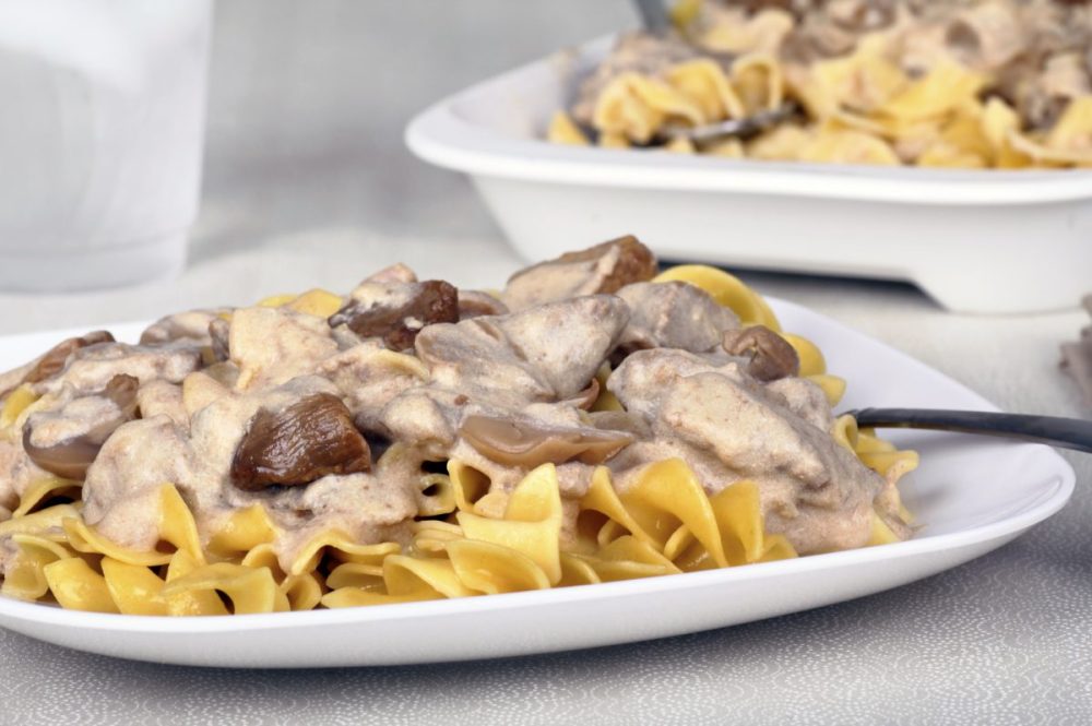 Beef stroganoff with beef tips, mushrooms and sauce over egg noodles